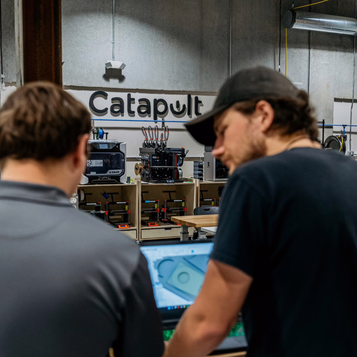 A Catapult member working on a project with a client.
